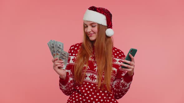 Woman in Christmas Sweater Looking Smartphone Sincerely Rejoicing Win Success Luck Receiving Money