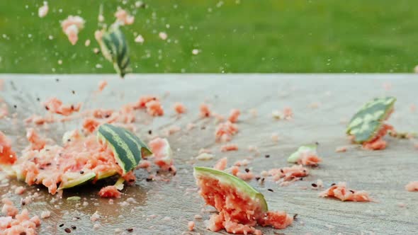 A Ripe Watermelon Falls To the Floor and Smashes To Pieces