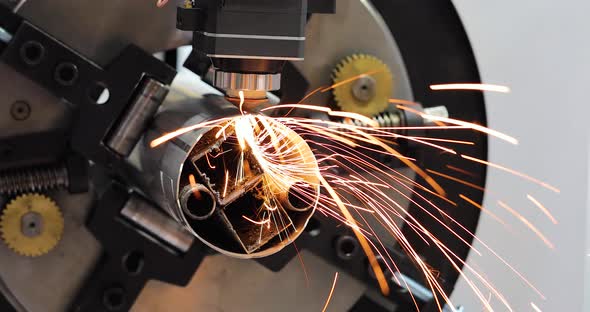 Industrial Laser Machine Cuts out Parts in Sheet Steel