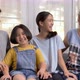 Slow motion Happy family sitting on sofa and take a photo together, Home sweet home - VideoHive Item for Sale