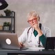 the Woman's Age Doctor Conducts an Online Consultation with the Patient - VideoHive Item for Sale