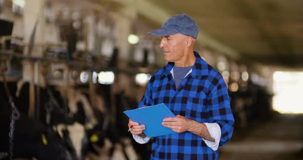 Farmer Working with Livestock