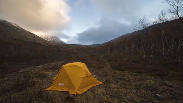 Tent and Clouds in Autumn Morning in Khibiny Mountains