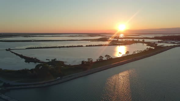 Sunset in the park of the Po River Delta