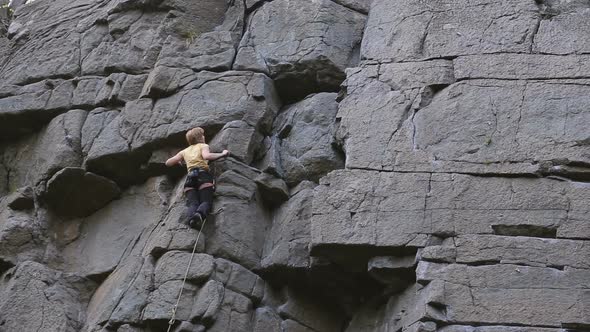 Rock Climber Reaches Top