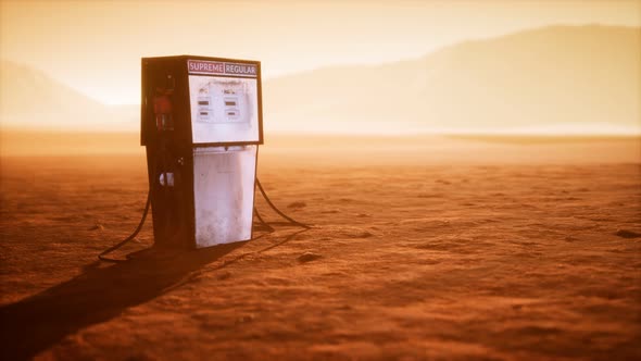 A Vintage Rusted Gas Pump Abandoned in the Desert alt