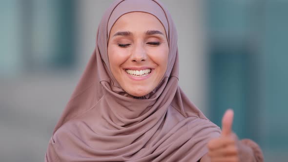 Closeup Muslim Happy Satisfied Contented Woman Wearing Hijab on Head Looking at Camera Smiling