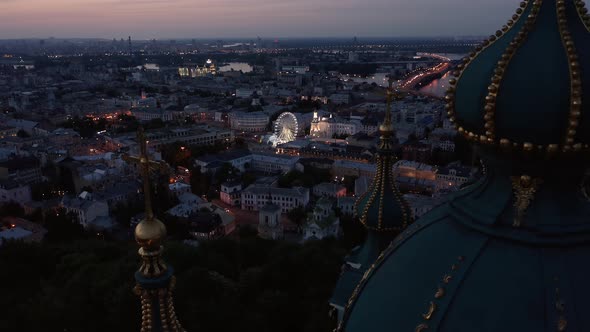 View From Drone Flying Over Church Domes to the City