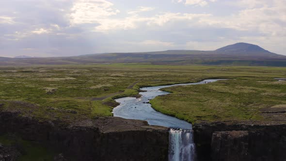 Flying Over the Oxarafoss Waterfall in Iceland