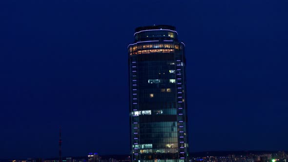 Aerial View of The Skyscraper on The Night City Background