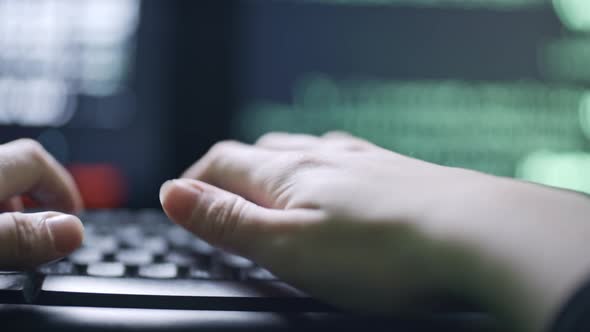 Woman Hacker Using Computer Keyboard