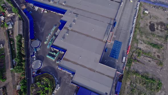 Aerial Top View of the Large Logistics Park with Factories