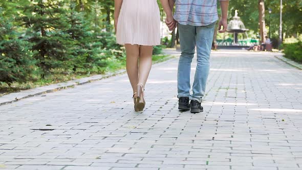 Romantic Date of Young Man and Woman, Couple in Love Walking in Summer Park