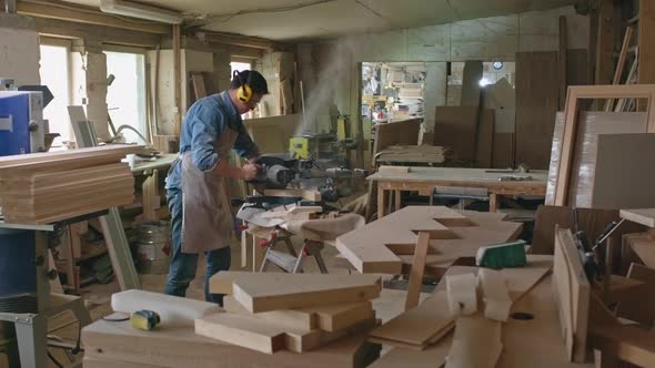 Carpenter Sawing Boards in Slow Motion alt
