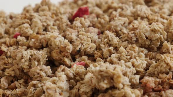 Close-up of high quality crunchy cereals 4K 2160p 30fps UltraHD footage - Panning on muesli with deh