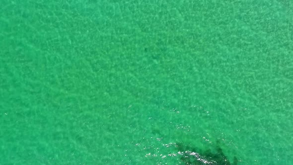 Aerial view of a scenic blue green lake
