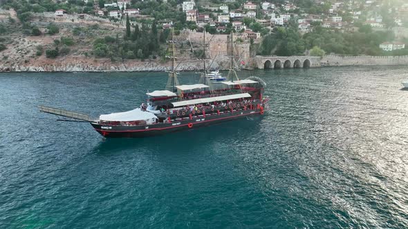 The Pirates yacht calls at the port aerial view 4 K