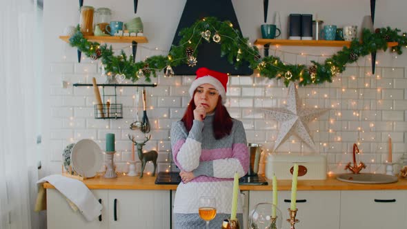 Thoughtful Woman in Festive Kitchen