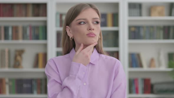 Portrait of Pensive Woman Thinking