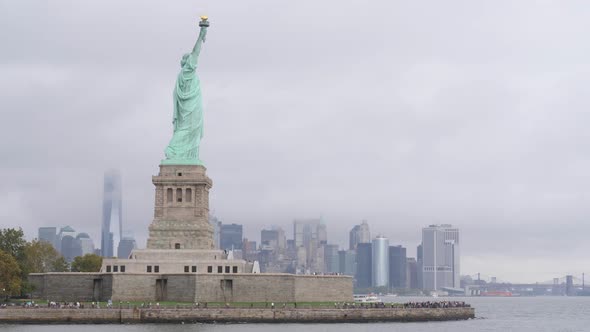 4k view of Statue of Liberty and Manhattan in the background, New York , USA