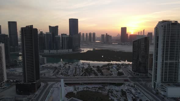 Sunset in Abu Dhabi Aerial View on Al Reem Island Surrounded By Modern Skyscrapers Between the