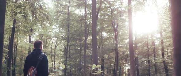 Guitar Player in the Woods