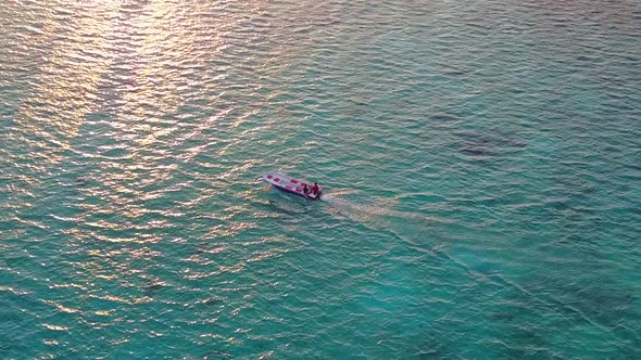 Wide angle abstract of marine resort beach journey by water with sand background near resort