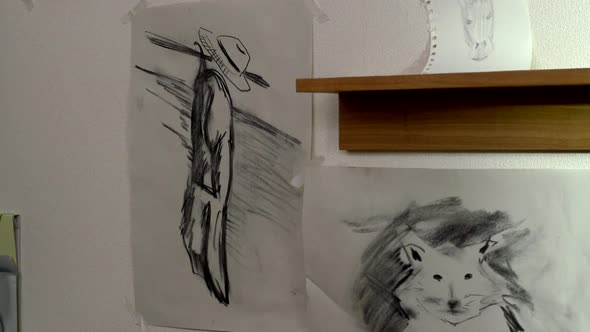Strange drawings hanging on the wall