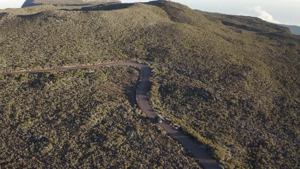 Aerial view of a car driving a serpentine road, Reunion.