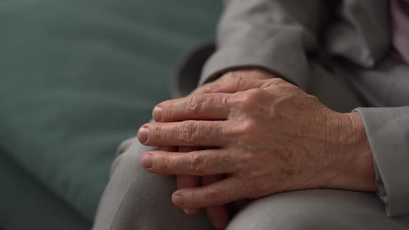 Closeup of the Hand of an Unrecognizable Elderly Woman
