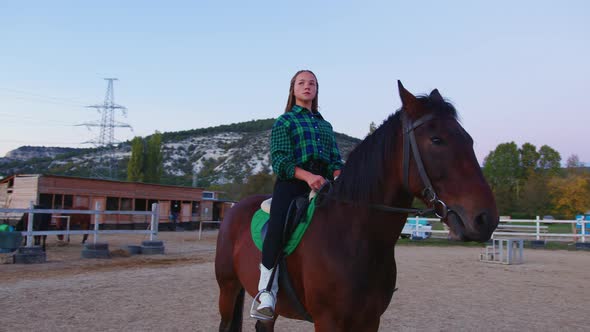 A Teenage Cowgirl on the Horseback