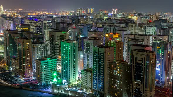 Aerial Skyline of Abu Dhabi City Centre From Above Night Timelapse