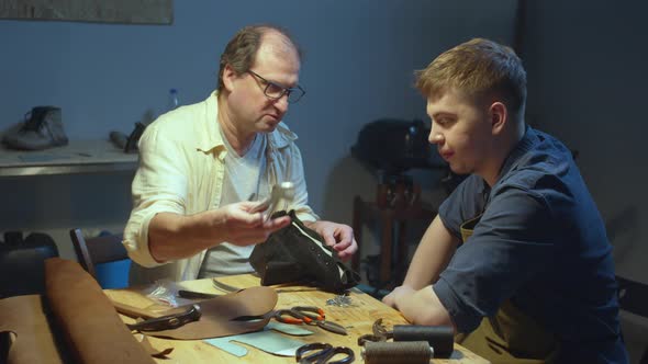 Master Shares a Secret with a Young Shoemaker