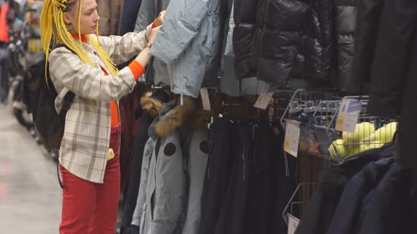 Beautiful Woman Shopping in Sportive Wear Store