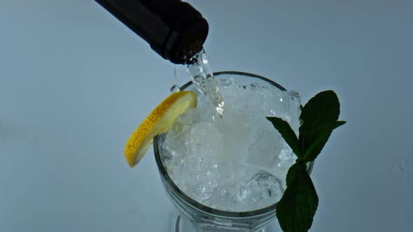 Bottle Pouring Liquid Cocktail Closeup