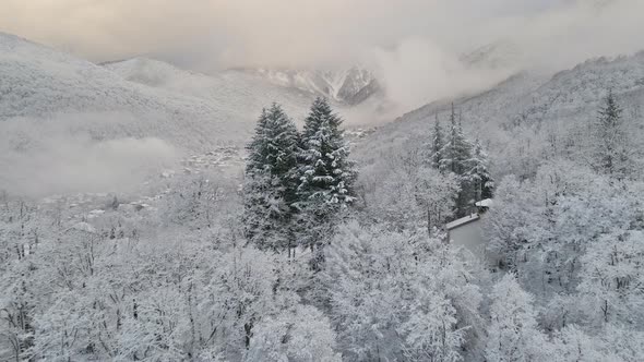 Krasnaya Polyana Village Surrounded By Mountains Covered with Snow