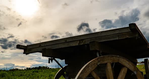 Antique Wooden Cart Standing Alone in a Field Beautiful Autumn Landscape Hyperlapse Time Lapse Heavy