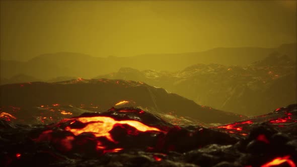 Black Lava Field with Hot Red Orangelavaflow at Sunset