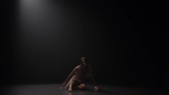 Gorgeous Maiden Dancing Contemp in Dark Studio. Slow Motion