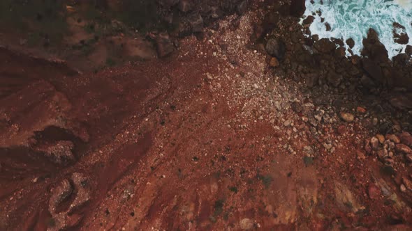 Drone shot from above showing landscape and waves