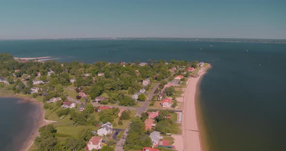 Aerial of Waterfront Houses and Beach Shore in Long Island on a Sunny Day