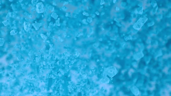 Super Slow Motion Shot of Blue Grain Makeup Powder Explosion at 1000 Fps