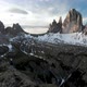Aerial Man Hiker In Front of Tre Cime di Lavaredo Mountain in Dolomites Italy - VideoHive Item for Sale