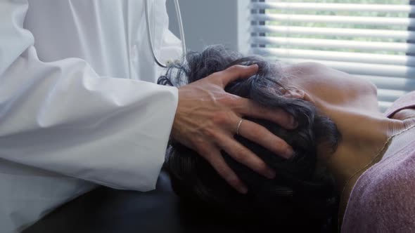 Physiotherapist at work in a hospital alt