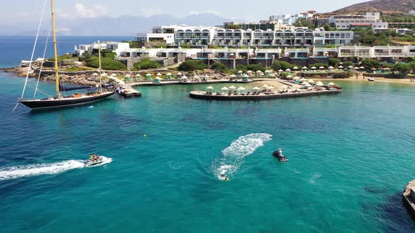 Aerial View of a Person Flyboarding in the Sea. Elounda, Crete, Greece