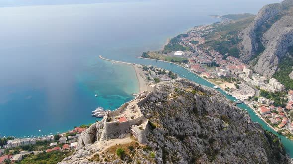 Aerial view of Starigrad Fortress (Fortica) on the hill over Omis town, Croatia