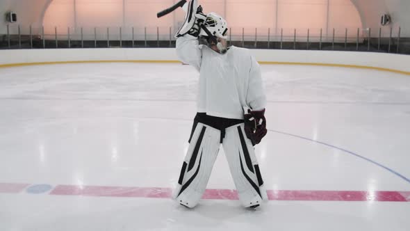 Portrait Of Goaltender On Ice Arena