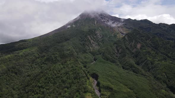 Aerial view of active Merapi mountain with clear sky in Indonesia