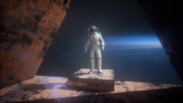 Astronaut on the Space Observatory Station Near Earth alt
