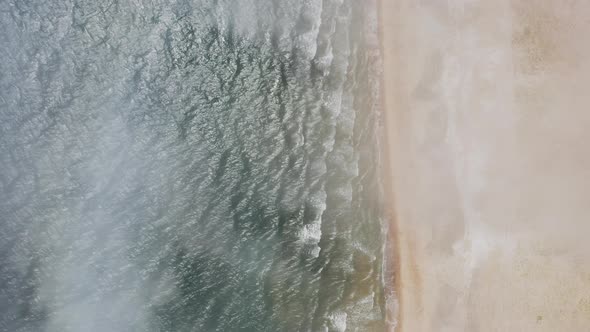 Aerial View Vertically Down the Sea Sandy Beach